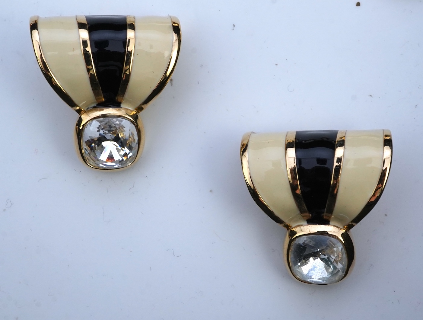 Two pairs of Givenchy clip earrings and four other pairs.